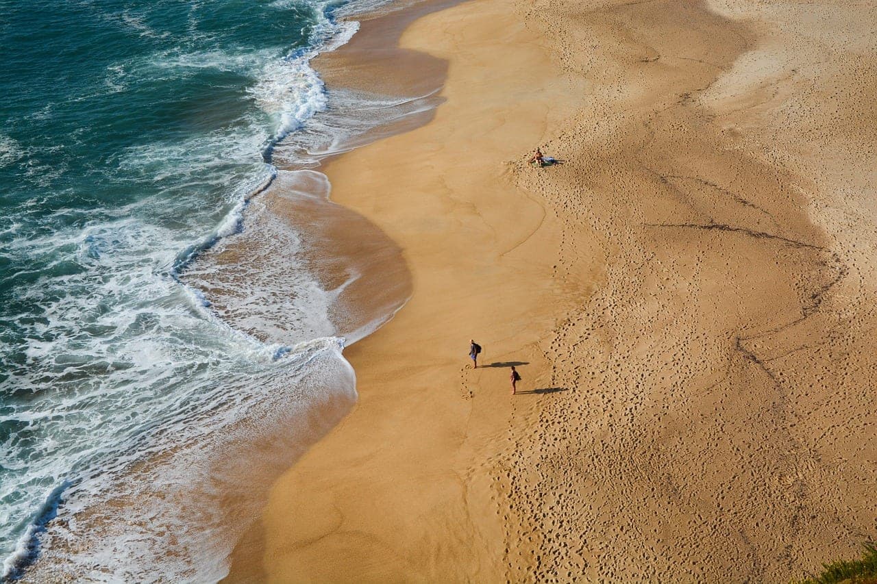 Golden Algarve cliffs above an Atlantic cove at Albufeira