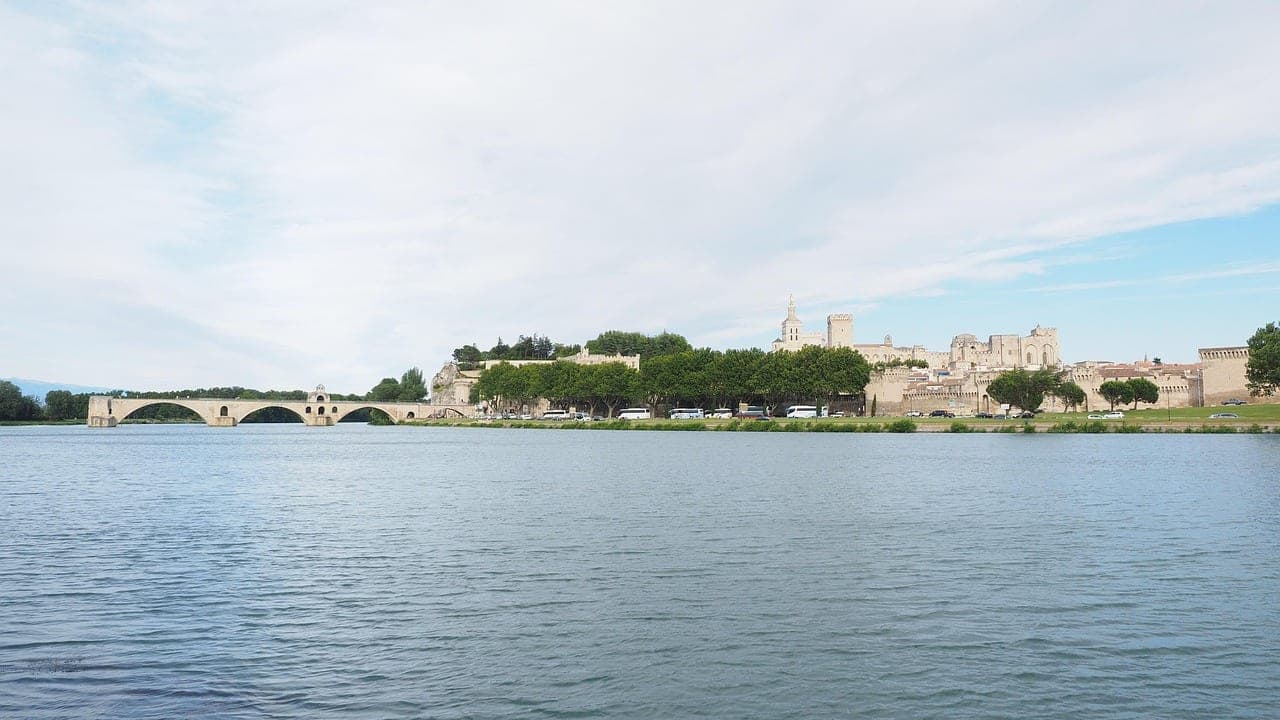 Pont d'Avignon and the Papal Palace fortress walls above the Rhône River in Provence