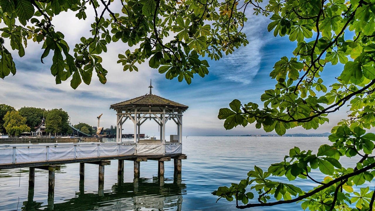 Floating opera stage on Lake Constance with Alpine peaks rising above Bregenz, Austria