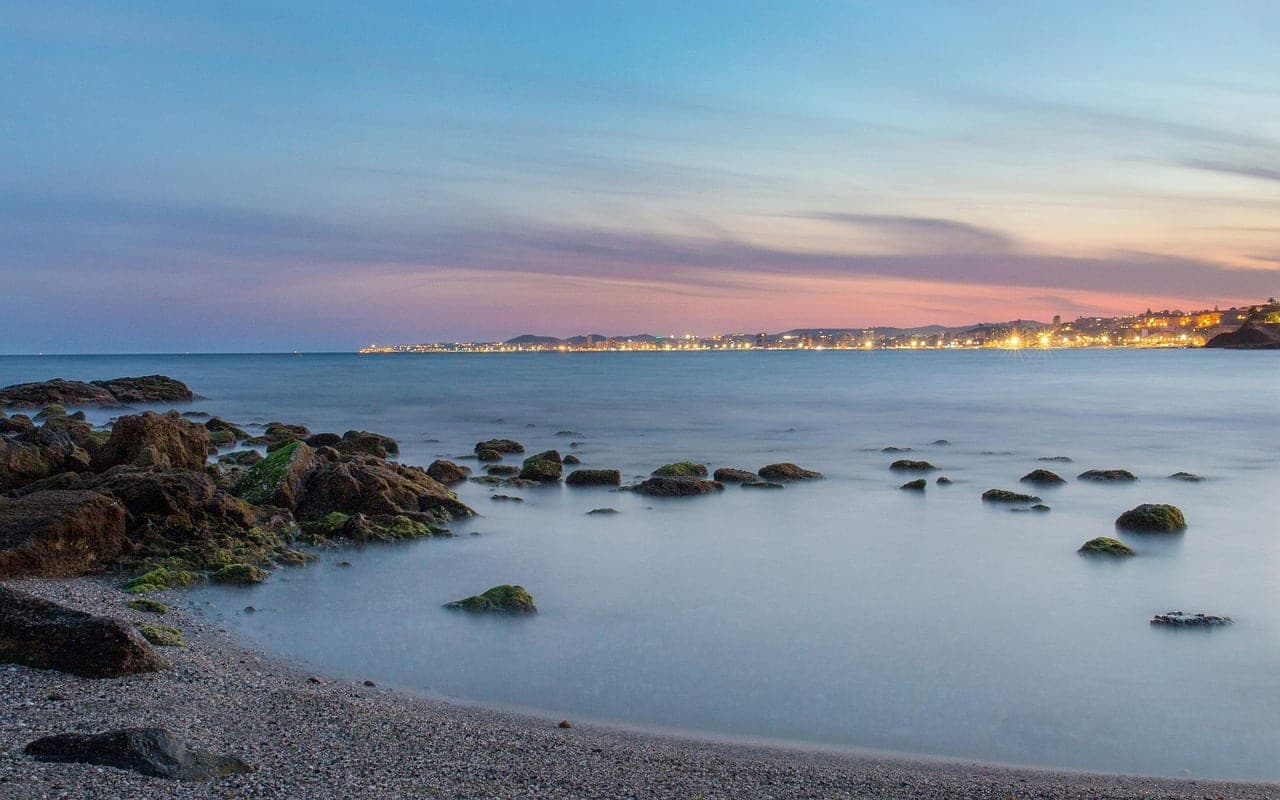 Wide Mediterranean beach and paseo marítimo at Fuengirola on Spain's Costa del Sol
