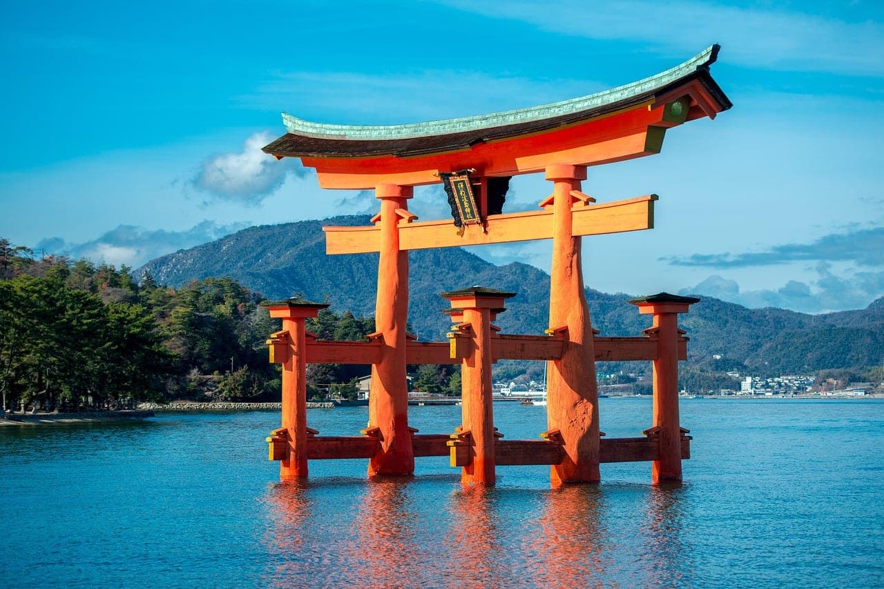 The vermilion floating torii gate of Itsukushima Shrine on Miyajima island near Hiroshima Japan
