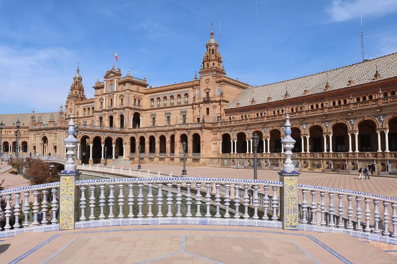 The semicircular Plaza de España in Seville at sunset, with its bridges over the canal in Andalusia, Spain