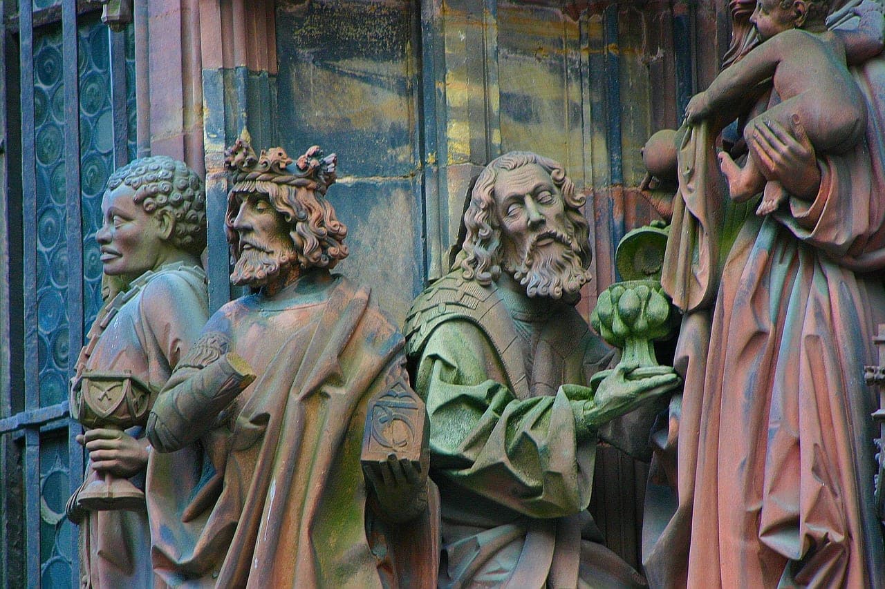 Pink-sandstone Strasbourg Cathedral above the half-timbered Petite France quarter, Alsace