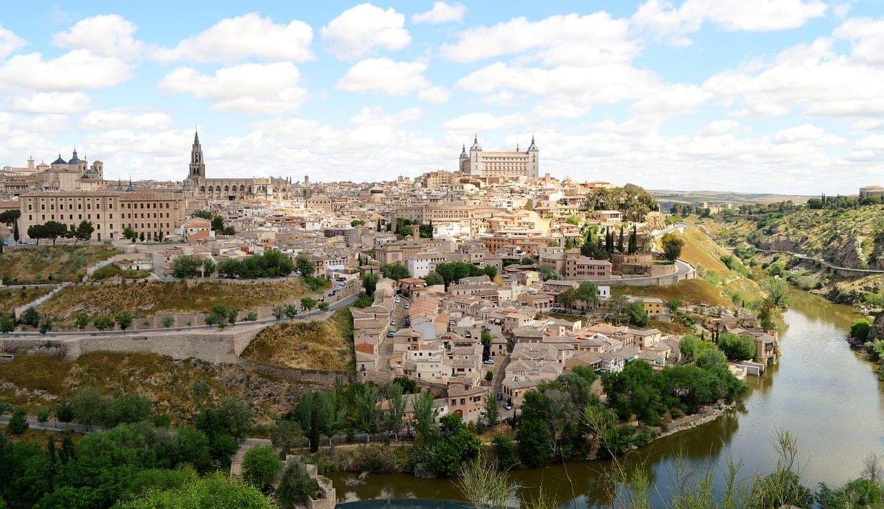 The hilltop medieval old town of Toledo above a bend in the Tagus river gorge in Castile, Spain
