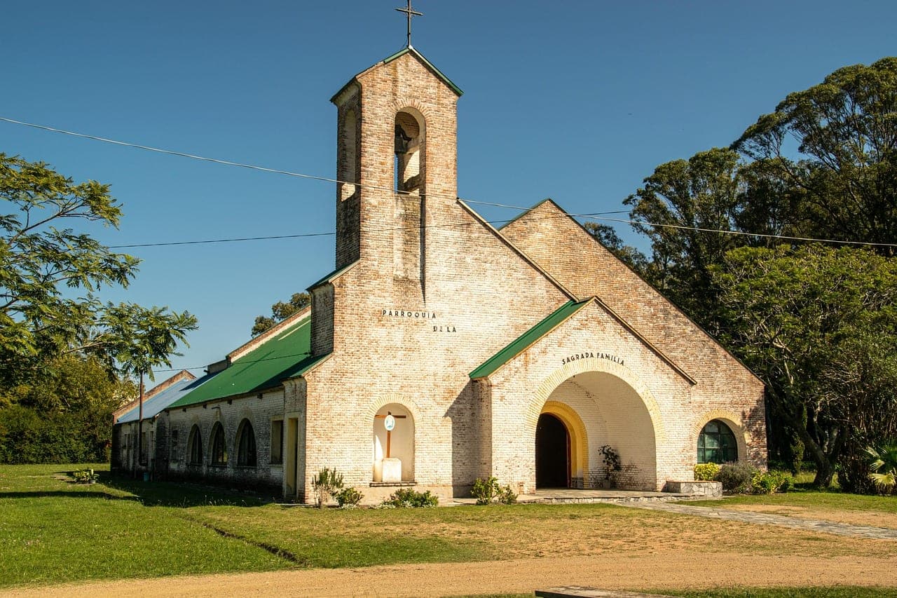 A small rural Catholic parish church — representative of the pilgrimage village setting of Medjugorje, Bosnia and Herzegovina