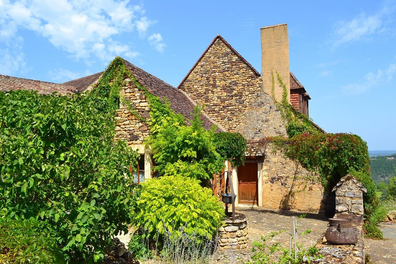 Honey-colored medieval stone facades of Sarlat-la-Canéda in the Dordogne, southwestern France